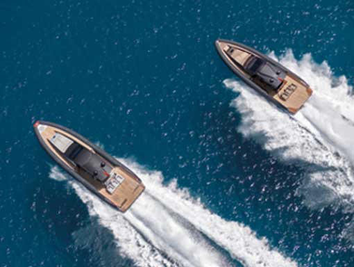 Aerial view of two speedboats carving up the water