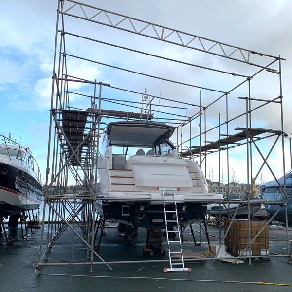 Yacht being worked on by engineer